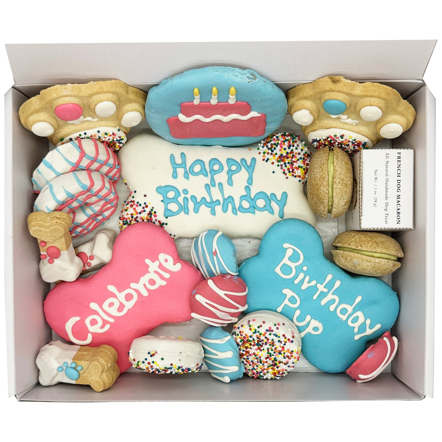 Box of birthday-themed cookies with decorative icing and text