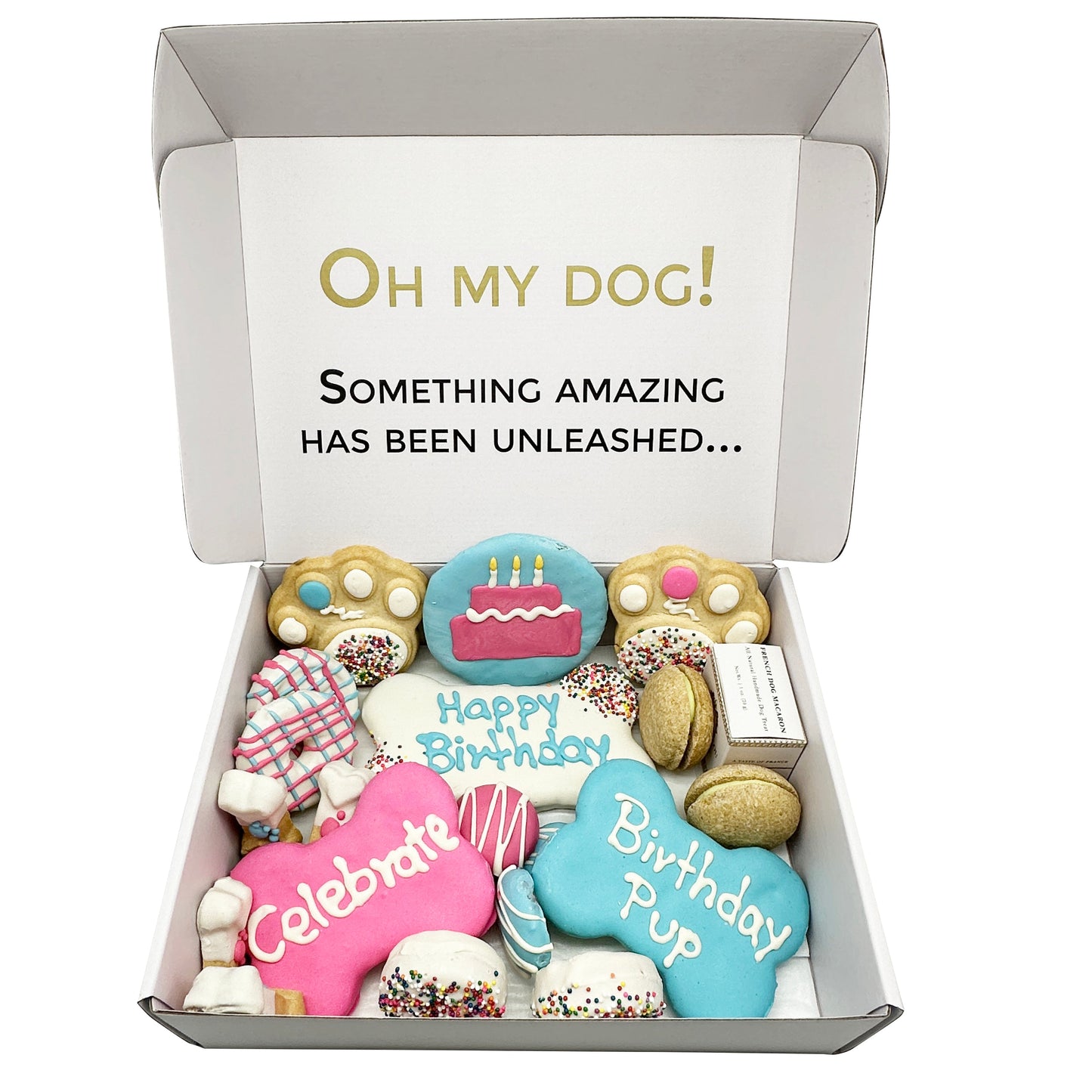 Box of dog birthday cookies with decorative text on a white background