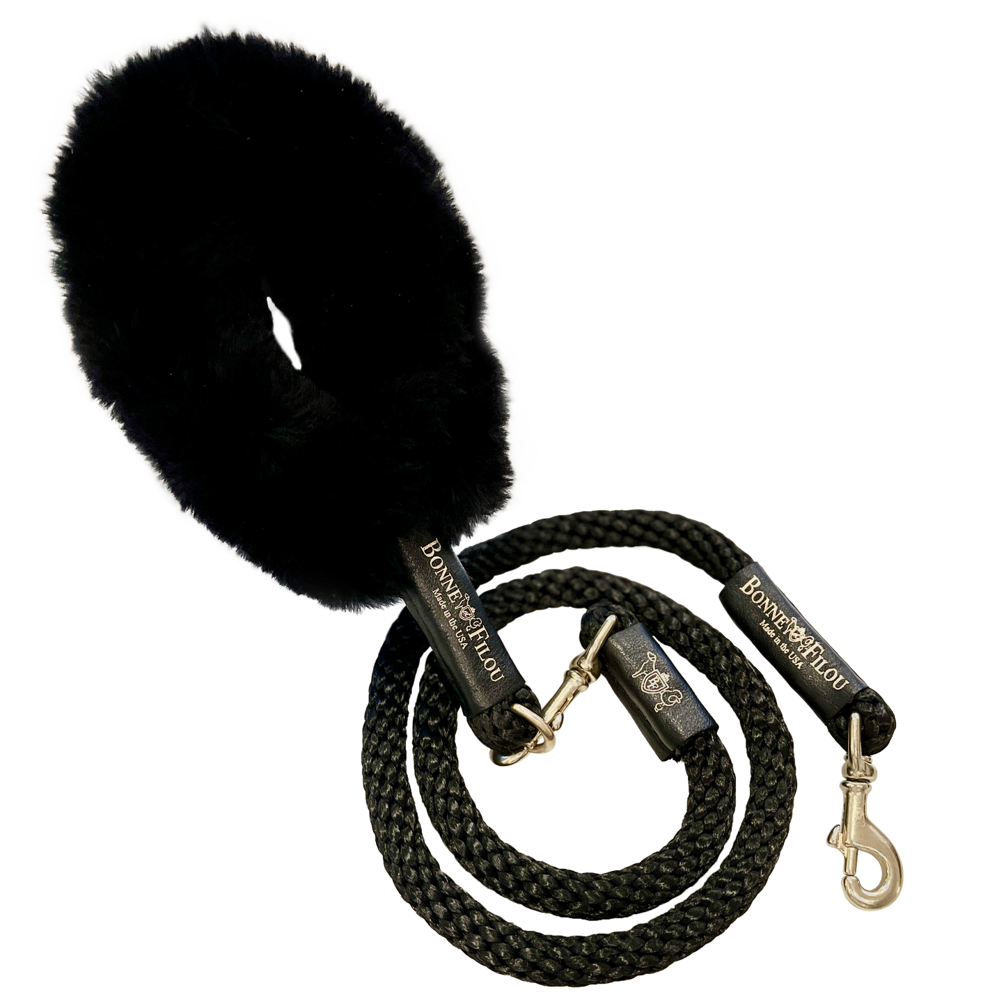 Black dog leash with a fluffy black end on a white background