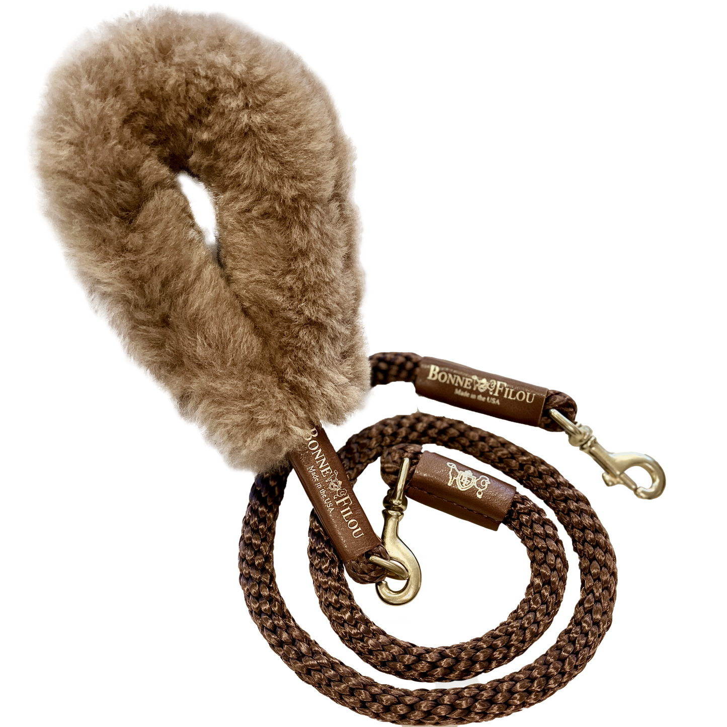Brown dog leash with fluffy handle on a white background
