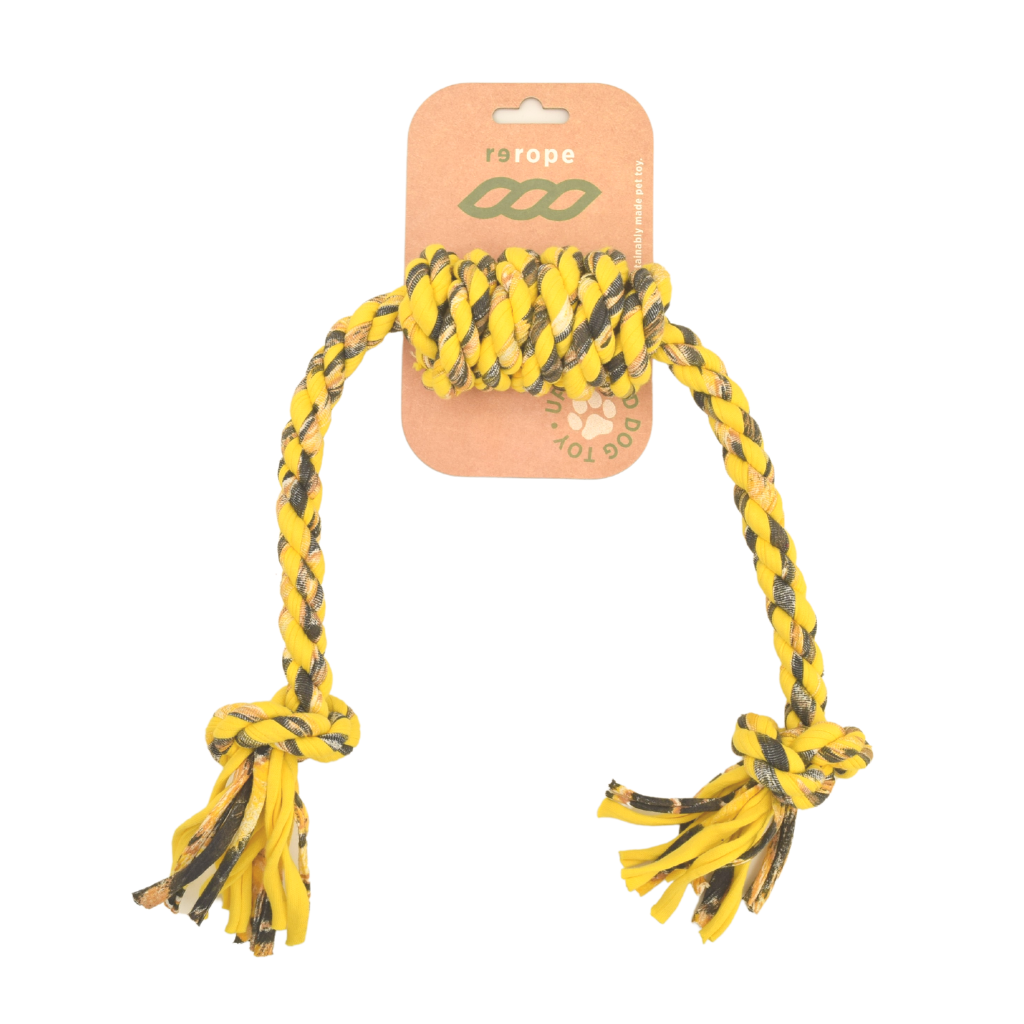 Yellow and black braided rope toy with packaging on a white background