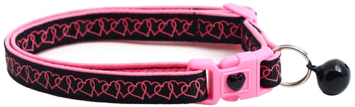 Pink dog collar with black heart pattern on a white background