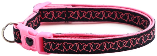 Pink and black dog collar with heart pattern