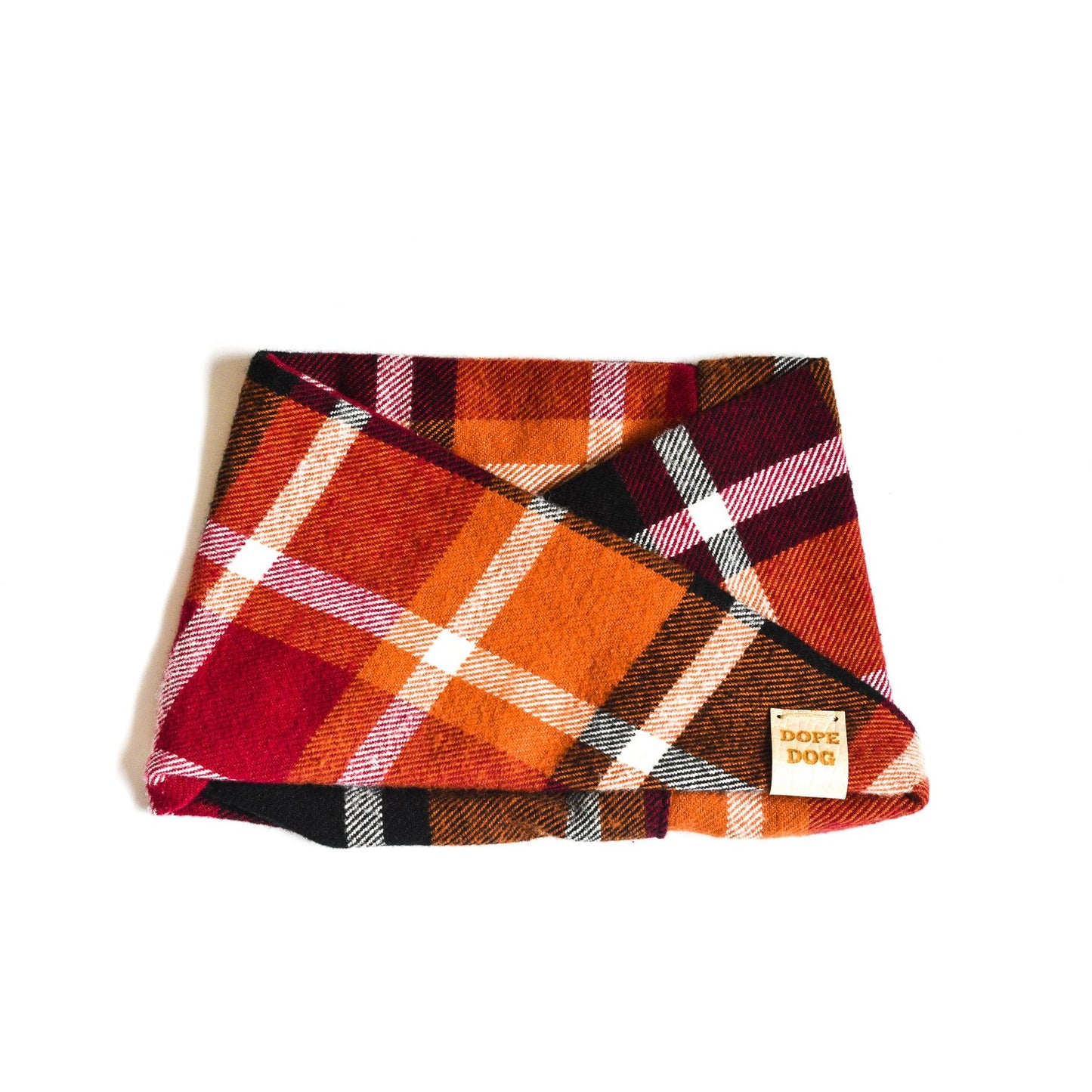 Plaid patterned product with a visible brand label on a white background