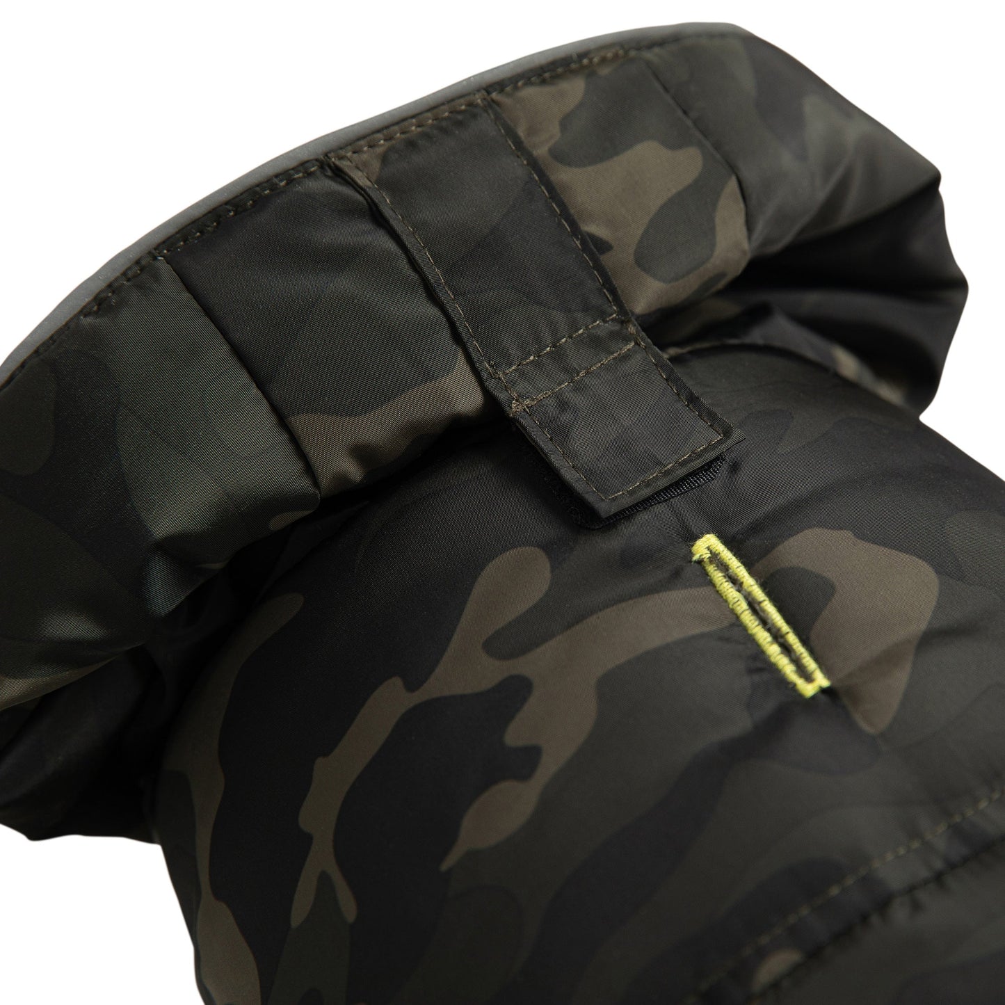Camouflage-patterned jacket with a yellow zipper on a white background