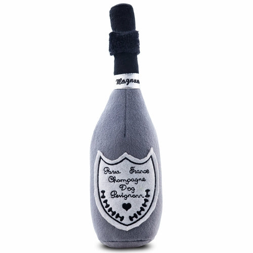 Plush toy shaped like a champagne bottle with text on a white background