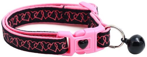 Pink and black cat collar with a bell on a white background