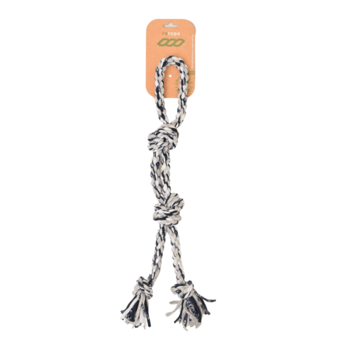 Dog rope toy with tassels on a white background