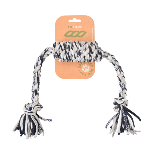 Dog rope toy with tassels on a white background