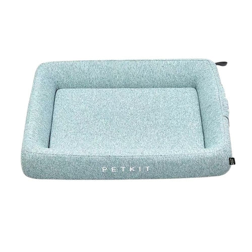 Pet bed with a textured surface and visible brand logo on a white background