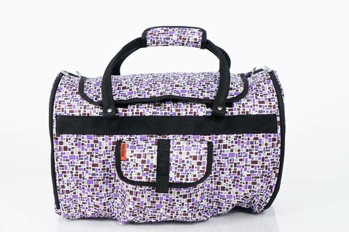 Patterned duffel bag with black handles and trim on a white background