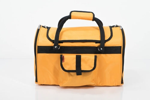 Yellow pet carrier with black straps on a white background