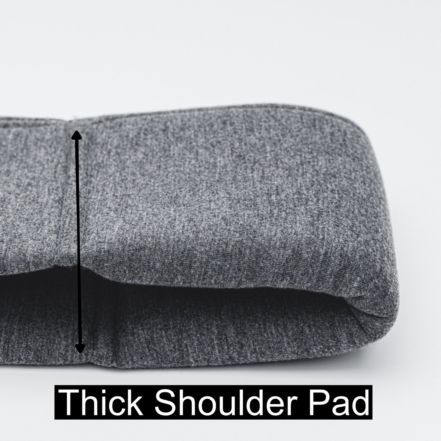 Gray shoulder pad with a thick padding section on a white background