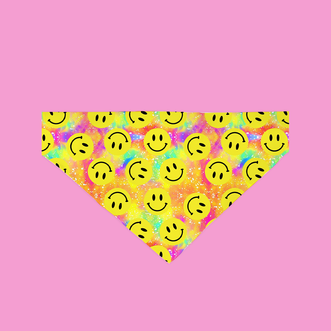 Neon smiley face patterned bandana on a pink background