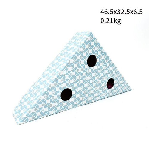 Triangular wedge-shaped product with blue pattern and black dots on a white background