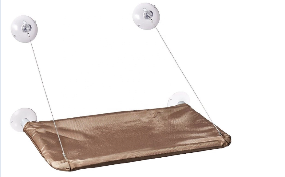Brown hammock with white hooks on a white background
