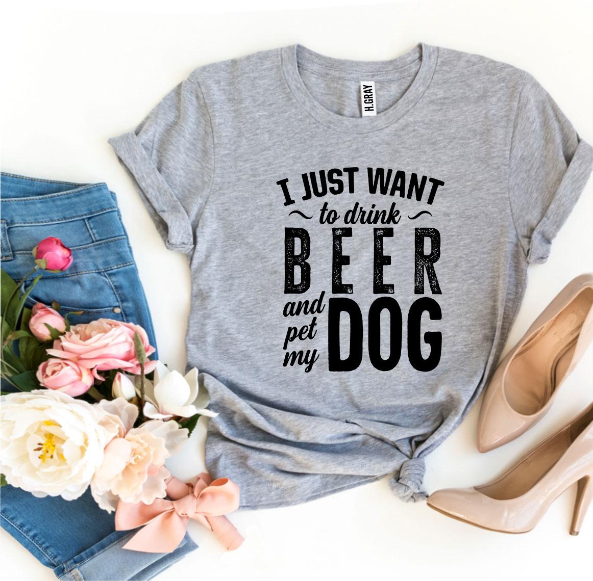Gray t-shirt with 'I just want to drink beer and pet my dog' text, paired with jeans, flowers, and high heels on a white background.