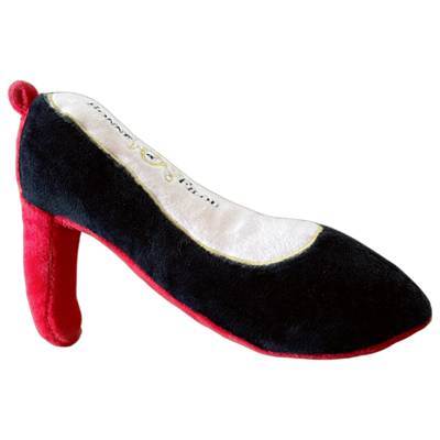 Black high-heeled shoe with red sole on a white background