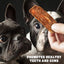 Two dogs looking at a dog treat held by a hand with text promoting dental health.