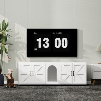 Digital clock displaying the time and date on a wall in a room with a dog and plant.