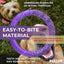 Purple dog chew toy with text about its benefits and usage, shown with a dog biting it.