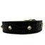 Black leather choker with gold accents and crystal-like stones on a white background