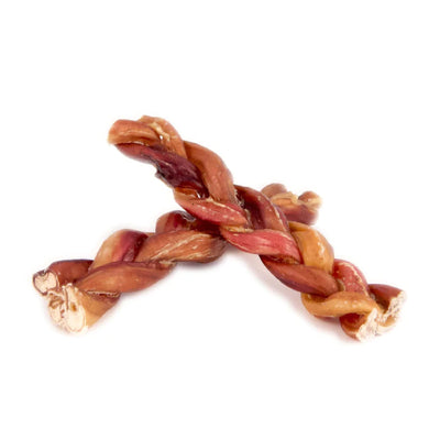 Braided dog treat on a white background
