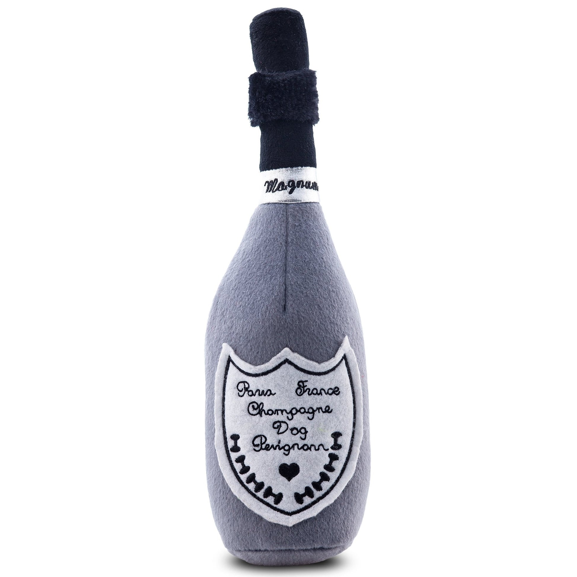 Plush toy shaped like a champagne bottle with branding on a white background