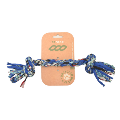 Dog toy with colorful braided rope on a branded card against a white background
