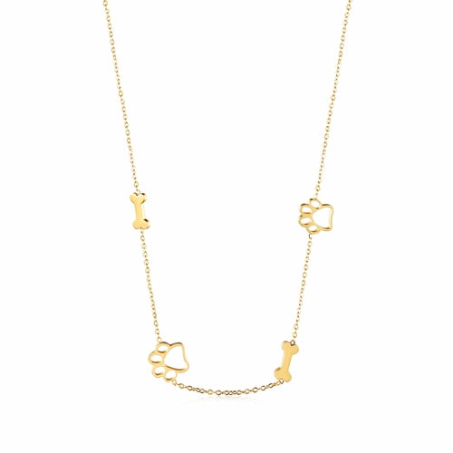 Gold necklace with bone and paw print charms on a white background