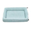 Pet bed with a textured surface and visible brand logo on a white background