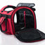Red and black pet carrier on a white background