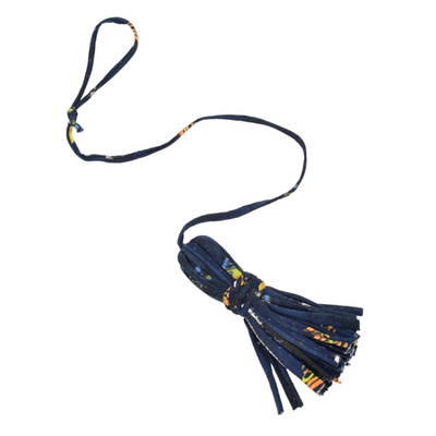 Navy blue dog leash with colorful tassels on a white background