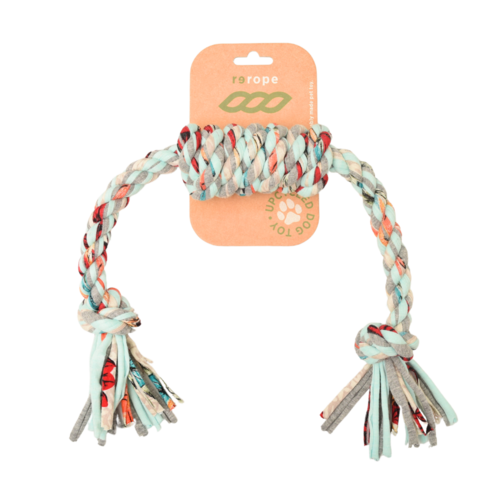 Dog rope toy with colorful tassels on a white background