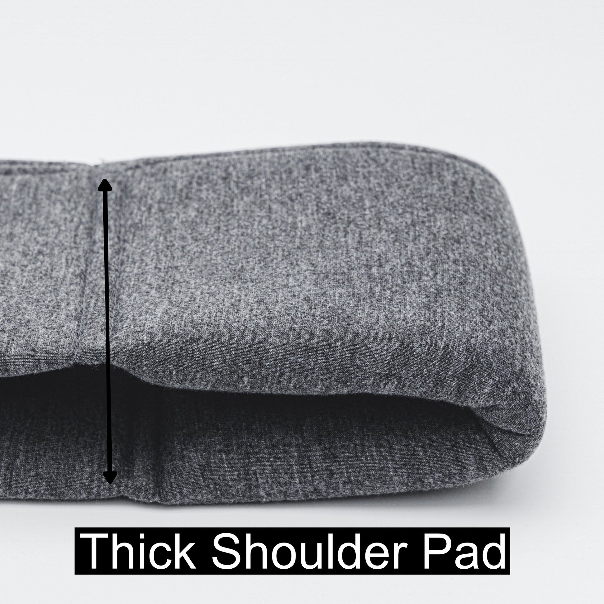 Gray shoulder pad with a thick padding section on a white background