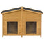 Wooden pet house with a gabled roof on a white background