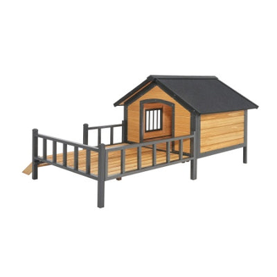 Wooden pet house with a black roof on a white background