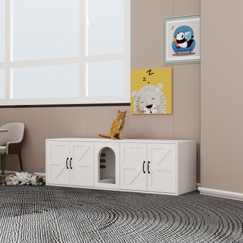 White pet furniture with a cat sitting on top, framed pictures on the wall, and a chair in the corner.
