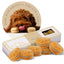 Dog macaron treats with a box and a circular inset of a dog with macarons.