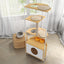 Wooden pet play structure with platforms and a hideout area on a wooden floor.