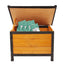 Wooden chest with open lid containing green packets on a white background
