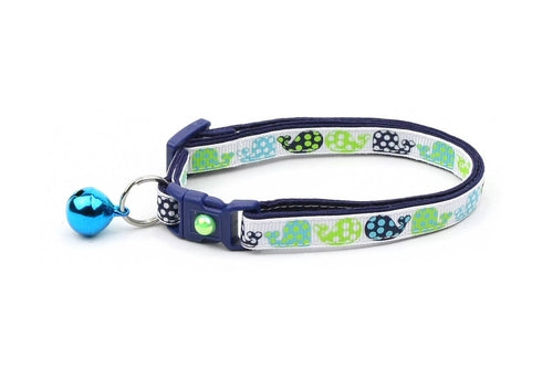 Cat collar with whale pattern on a white background