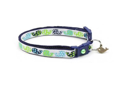 Dog collar with blue and green pattern on a white background