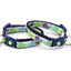 Two dog collars with green and blue patterns on a white background