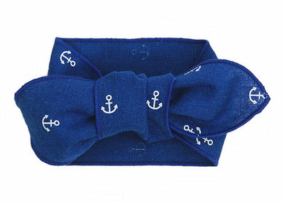 Blue headband with anchor pattern on a white background